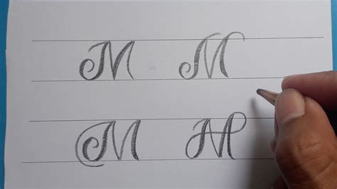 how to write the letter m in cursive